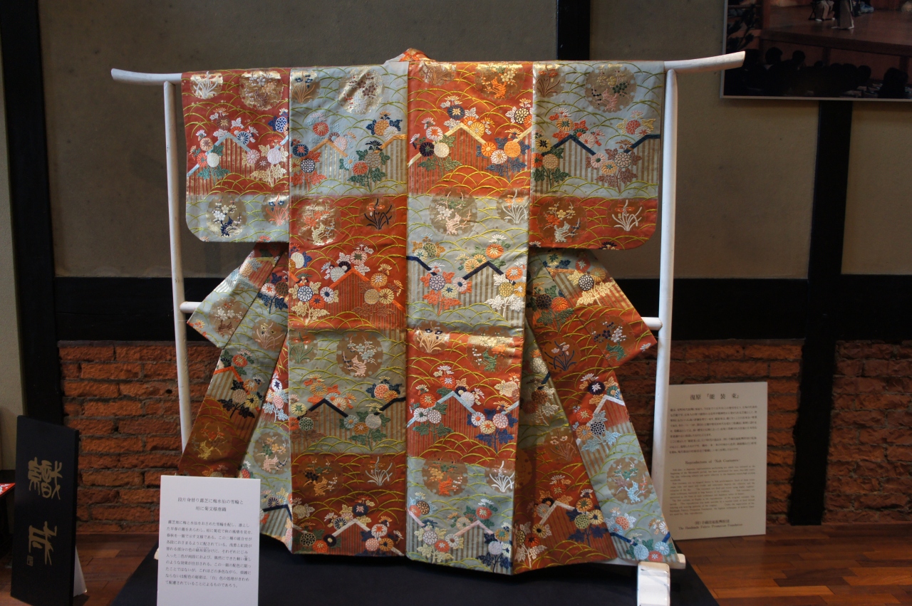 西陣織 手織り彩り蜀甲華紋 水色 六通柄袋帯