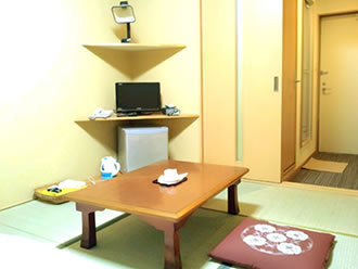 ビジネスホテルインターふじもと 写真