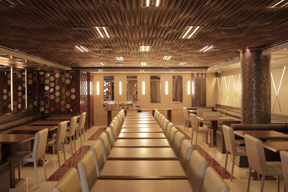 ラマダ バイ ウィンダム マナウス トレ センター 写真