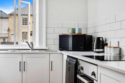 Portsea Place - Chic queen studio and parking 写真