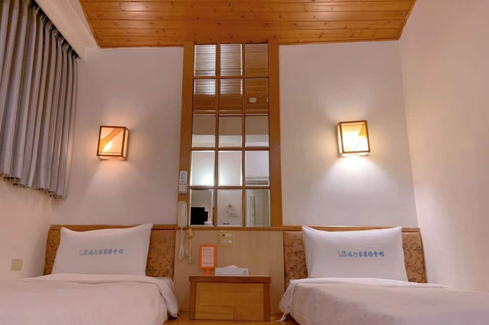 タイタン トラベラー ホテル 写真