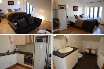 ２泊目のお部屋。天井が斜めですが、浴室にはジャグジーあり。