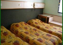 ホテル マック ベッド 写真