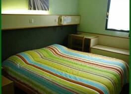 ホテル マック ベッド 写真