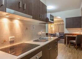 ハイランダー モーターイン & アパートメント 写真