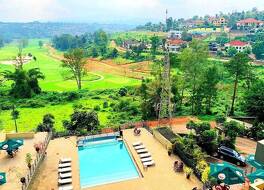 スイス インターナショナル ヴィラ ポルトフィーノ キガリ 写真