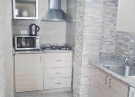 ルーツ アパートメント ホテル 写真