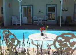 パラディソ ゲストハウス&セルフ ケータリング コテージ