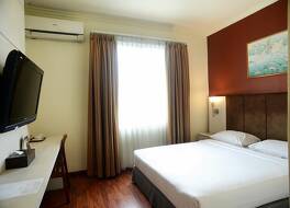 ホテル アヌゲラ パレンバン 写真