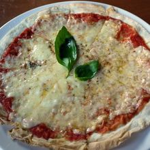 噴火したピッツァ ￥１，０２９− 