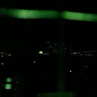 客室から「りんくうたうん、関空連絡橋」方面夜景
