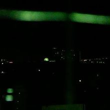 客室から「りんくうたうん、関空連絡橋」方面夜景