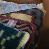 毛布４枚重ねはズッシリ重い…