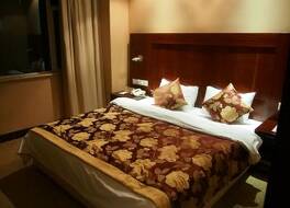 エンジョイ インターナショナル ホテル 写真