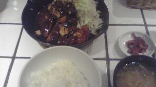 ぶ厚い豚肉のステーキ