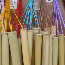 願い事を書く竹筒が売っています