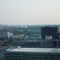 最上階の展望風呂から見た富山駅方向の景色