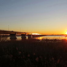 鹿島バイパスの新神宮橋と夕陽
