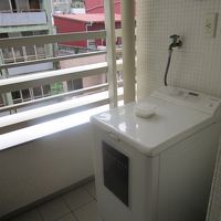 洗濯機はベランダにあります。