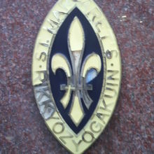 立教女学院の校章です。英国聖マーガレット王妃に由来しています