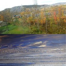 上層階からの鉱山の眺め（上）と雪景色（庁舎内展示の写真）
