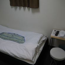 ニュー松竹梅ホテルの簡易な客室
