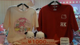 独特の淡いピンクのＴシャツとか