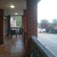 こちらの共用テラスで喫煙できます。