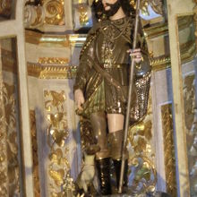 ペストに感染したロケの傷をなめ、パンを運ぶ伝説の犬