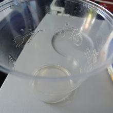 ジュースカップにもチューリップと自転車と飛行機の模様