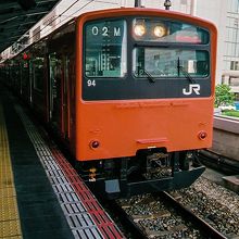 大阪駅停車中の桜島行き201系。