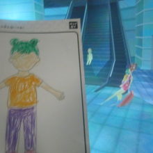 塗り絵のキャラをスキャンしたのがお客として映像反映されてる。