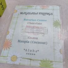 オーダーカウンターの上に貼られたマラサダメニュー