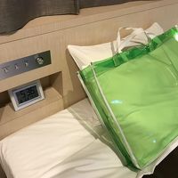 緑色のバッグに入ってるのは選べる枕です