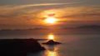 夕陽の海に礼文島と利尻岳