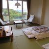 田沢湖とスキー場のゲレンデが見える家庭的な宿