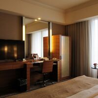 博多織のデザインを生かした質感高い客室