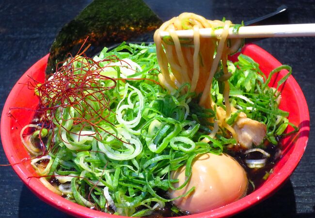 Ramen restaurant with a very dark-colored soup