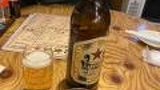 マグロぶつ、もつ煮込み、串焼きを赤星とコップ酒で！