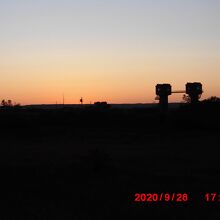 夕陽に映える岩保木水門