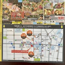 周辺居酒屋のドリンク1杯無料券など付いたマップ