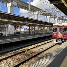 蛍池駅にて