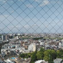 多摩川越しに都心の風景