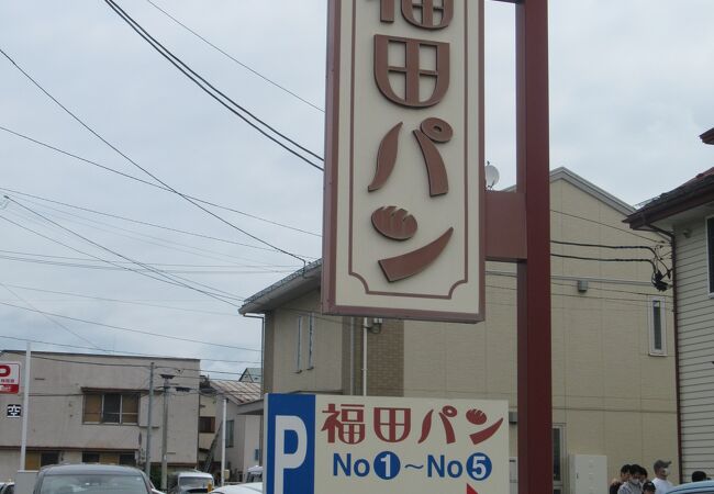 北上川沿いに座って食べる朝食