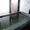リニューアルされた部屋の温泉展望風呂でのんびりと