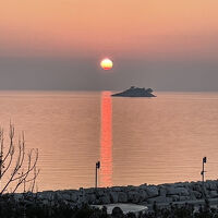 ベランダから見る沈みゆく太陽