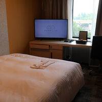 シングル（18平米、禁煙）のお部屋。シンプルな造りで清潔