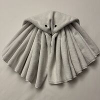 ベッドの上にあった。タオルのイカ。