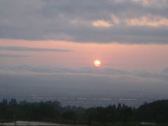 「越後信濃川と夕日」と「雲海」