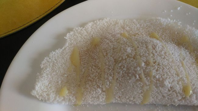 写真コメント:名物のタピオカクレープをホテルで食べました(ビュッフェ会場で作っていた)。練乳をかけて食べます。あまーい(中はバナナとか)<br /><br />今回は10日目①です(前回までの日記、日付カウント間違えました・・・)<br /><br />★10日目★<br /><br />8:00過 ホテル出発<br /><br />~サンルイス市内観光~<br /><br />10:30 サンルイス→バヘリーニャス(バス)<br /><br />12:00過 ランチ(in モロス)<br /><br />16:00過 ホテル着<br /><br />17:00頃 レンソイス遊覧飛行(待ち時間合わせて1時間弱)<br /><br />19:00 夕食<br /><br />~就寝~